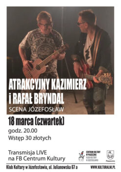 Dwóch gitarzystów na scenie
