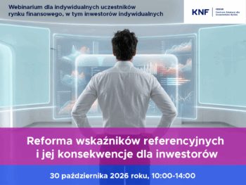 człowiek w białej koszuli przed monitorem