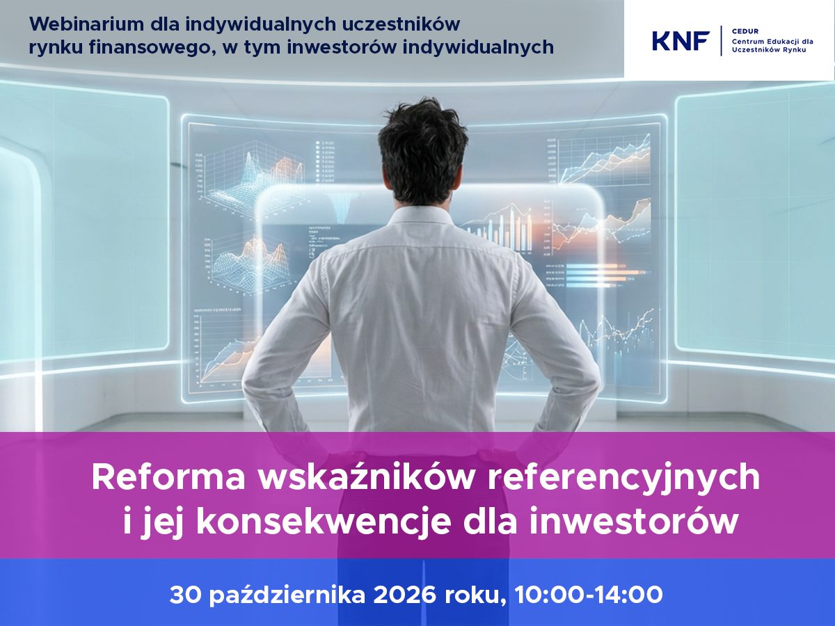 człowiek w białej koszuli przed monitorem